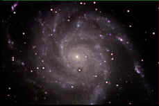 This shot of the spiral galaxy M101 was taken at Blueberry Pond Observatory using the advanced digital astronomy equipment found there.  Visiting families and students do visual observing through a 12" telescope, and then take their own digital pictures showing tremendous deail in faint galaxies, nebulas, and star clusters.